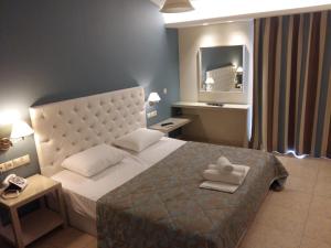 Posteľ alebo postele v izbe v ubytovaní Viaros Hotel Apartments