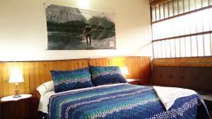 Voodi või voodid majutusasutuse Toninas Hotel toas
