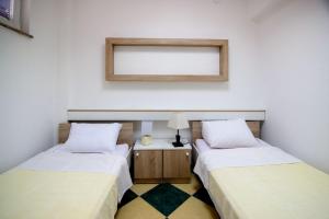 Ένα ή περισσότερα κρεβάτια σε δωμάτιο στο Villa Zubak +44 φωτογραφίες