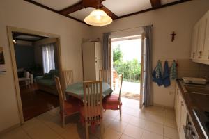 Kuchyň nebo kuchyňský kout v ubytování Apartment Pijer