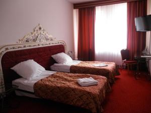 Cama ou camas em um quarto em U Schabińskiej - Jedzenie i Spanie w Jaśle