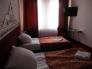 Cama o camas de una habitación en U Schabińskiej - Jedzenie i Spanie w Jaśle