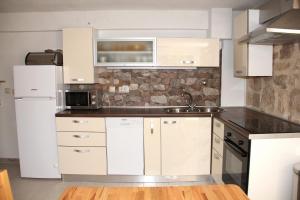 Kuchyň nebo kuchyňský kout v ubytování Vacation home Ania