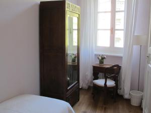 A bed or beds in a room at Le Porte di Marzo