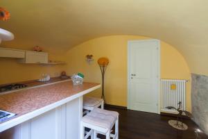 Kuchyň nebo kuchyňský kout v ubytování B&B La Pulce Dorata + 31 fotografií