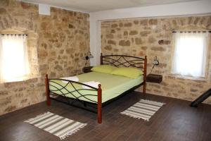 Postel nebo postele na pokoji v ubytování Vacation home Ania