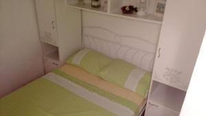 Posteľ alebo postele v izbe v ubytovaní Apartments Ivica Mateljak