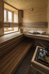 Voodi või voodid majutusasutuse Ahorn Chalet Mittelberg toas
