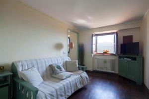 TV a/nebo společenská místnost v ubytování B&B La Pulce Dorata