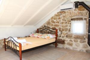 Postel nebo postele na pokoji v ubytování Vacation home Ania