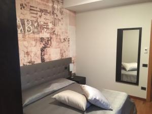 Voodi või voodid majutusasutuse Hotel Maloia toas