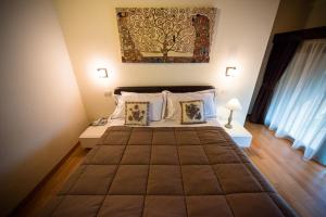 A bed or beds in a room at Residence Cà Beregana