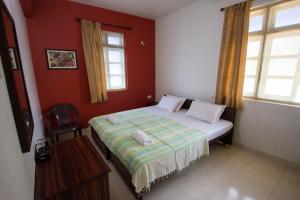 Postel nebo postele na pokoji v ubytování Veeniola Holiday Home