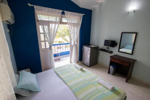 Postel nebo postele na pokoji v ubytování Veeniola Holiday Home