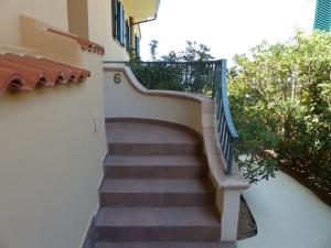 a staircase leading up to a building at Chic Apartment in Parghelia Italy in Parghelia