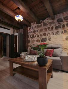 Posedenie v ubytovaní Apartamentos Alcantara