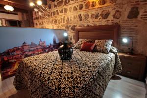 Posteľ alebo postele v izbe v ubytovaní Apartamentos Alcantara