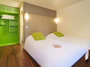 Postel nebo postele na pokoji v ubytování Campanile Orleans - La Source + 20 fotografií