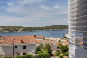 a view of a body of water from a building at The Look in Mali Lošinj