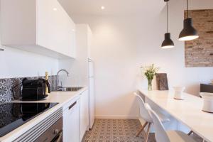 Kuchyň nebo kuchyňský kout v ubytování Aspasios Charming Flats