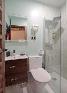 Kúpeľňa v ubytovaní Apartamentos Alcantara