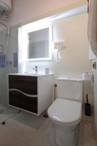 Kúpeľňa v ubytovaní Apartamentos Alcantara
