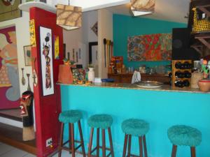 The lounge or bar area at Pousada Temperança
