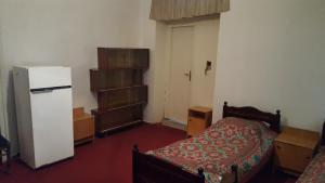 Ένα ή περισσότερα κρεβάτια σε δωμάτιο στο Firuza Hostel