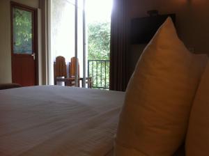 Postel nebo postele na pokoji v ubytování Villa Arunalu Kandy