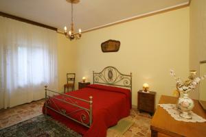 מיטה או מיטות בחדר ב-Casa Elena