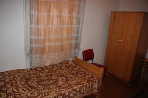 Ένα ή περισσότερα κρεβάτια σε δωμάτιο στο Firuza Hostel
