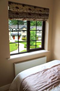 Postel nebo postele na pokoji v ubytování Garden View Self Catering Lough Rynn