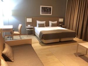 Кровать или кровати в номере Hotel Ponte Sor
