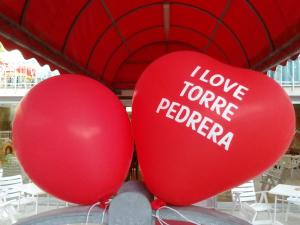 two red balloons with the words i love forever peporo at Hotel Seven in Rimini