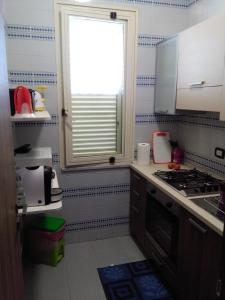 Η κουζίνα ή μικρή κουζίνα στο Sweet House Salvina