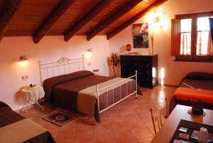 Posteľ alebo postele v izbe v ubytovaní B&B Beata Solitudo