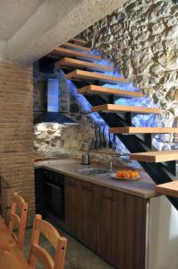 A kitchen or kitchenette at Limni Stone Apartments