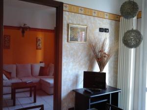 A television and/or entertainment centre at Appartamento del Parco