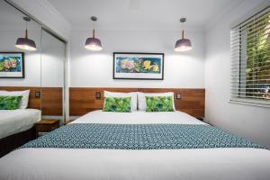 Postel nebo postele na pokoji v ubytování Watermark Resort Caloundra