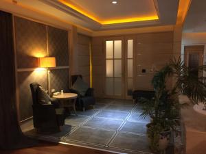 Posezení v ubytování ChangSing Business Motel