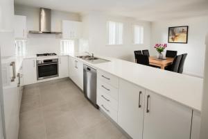Kuchyň nebo kuchyňský kout v ubytování Wallsend Executive Apartments