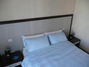 Postel nebo postele na pokoji v ubytování Agriturismo Campoverde