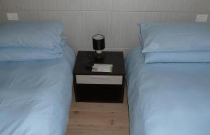 Postel nebo postele na pokoji v ubytování Agriturismo Campoverde