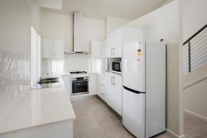 Kuchyň nebo kuchyňský kout v ubytování Wallsend Executive Apartments