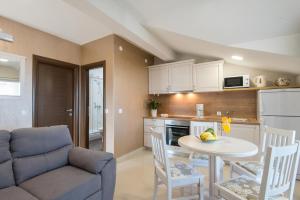 Kuchyňa alebo kuchynka v ubytovaní Apartments Villa Stella