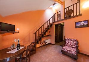 TV a/nebo společenská místnost v ubytování Agriturismo Torrazzetta