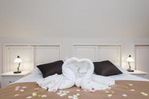 Posteľ alebo postele v izbe v ubytovaní Apartments Villa Stella