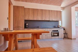 Kuchyňa alebo kuchynka v ubytovaní Residence Sněžka