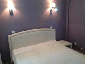  Кровать или кровати в номере Apartment Ostrovskogho 37 