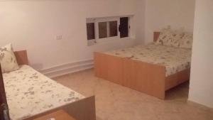 Postel nebo postele na pokoji v ubytování Apartmani Alex Beach